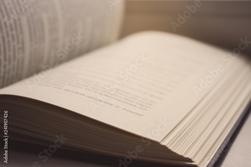 Open book isolated. Literature and education concept. Knowledge and wisdom background. Open pages with text. Library concept. Book storage. Open information. Read and study. Open book on table.