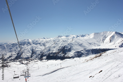 ski chair lift in blue sky