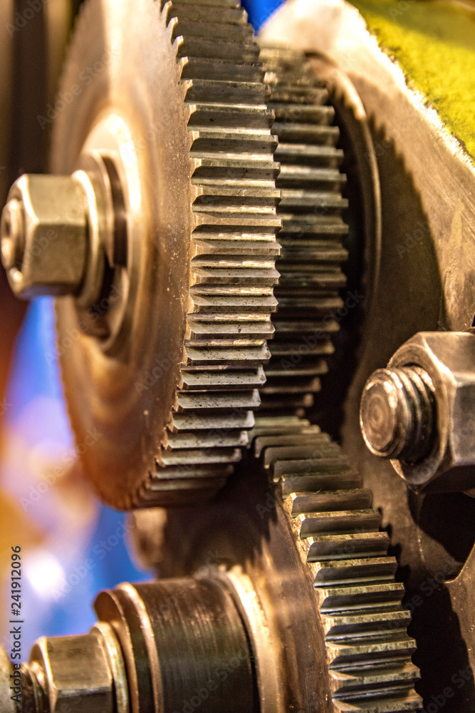 Large cog wheels in the motor Gear box of mechanism in a factory Large cog wheels in the motor Gear box of mechanism in a factory