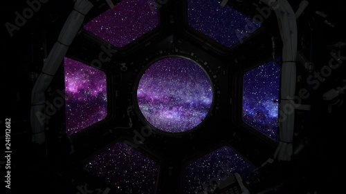 CGI depiction of space flight into a star field captured through a space shuttle window.