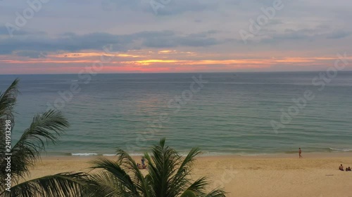 aerial view beautiful sunset over coconut trees at Karon beach Phuket Thailand photo