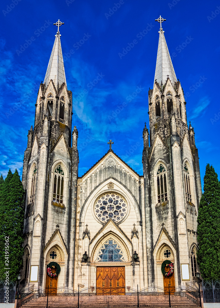 Cathedral church of Botucatu under blue sky with clouds at dawn