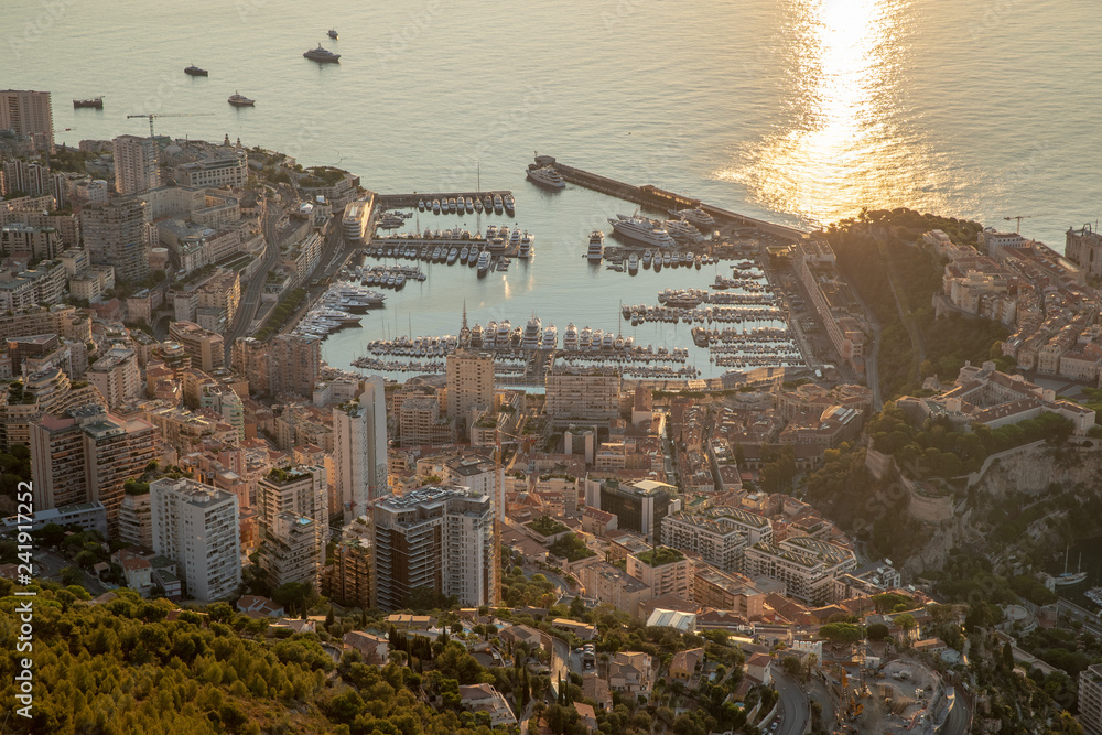 Aerial view of Kingdom of Monaco at sunrise, view from La Turbie, landmark of Monaco, Monte-Carlo, port Hercules, port Fontvieille, Monaco Ville, Palace of Prince, Cruise liner, blue sea, morning