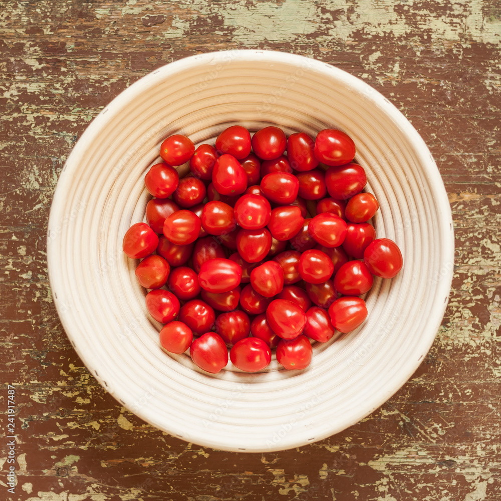 Wicked basket with fresh picked cherry tomatoes Wicked basket with fresh picked cherry tomatoes