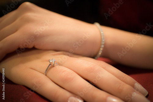 hands with wedding rings and wristlet