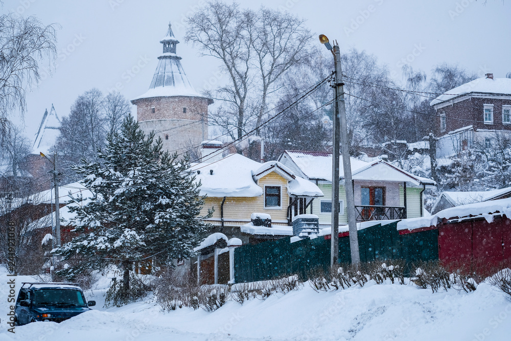 Russia, Zaraysk - Janyary, 4, 2019: the image of rural lodges in Zaraysk in snowfall