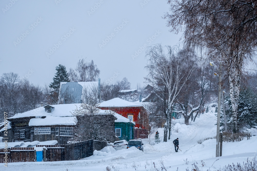 Russia, Zaraysk - Janyary, 4, 2019: the image of rural lodges in Zaraysk in snowfall