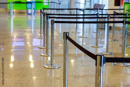 Row empty check-in desks in international airport