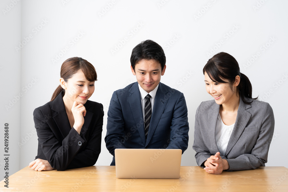 asian business group using laptop
