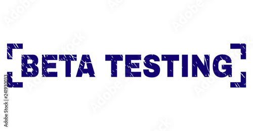 BETA TESTING caption seal print with distress texture. Text caption is placed inside corners. Blue vector rubber print of BETA TESTING with dirty texture.