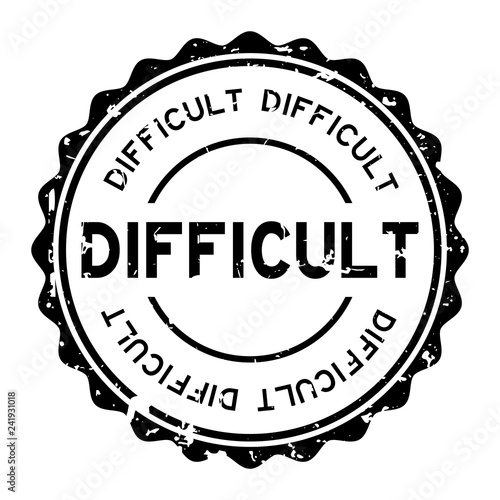 Grunge black difficult word round rubber seal stamp on white background