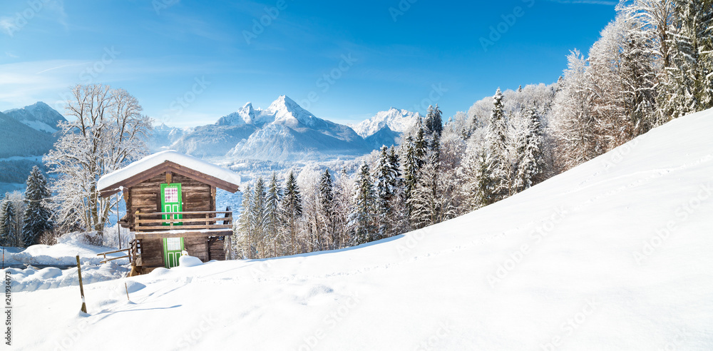 Winter wonderland with mountain hut in the Alps