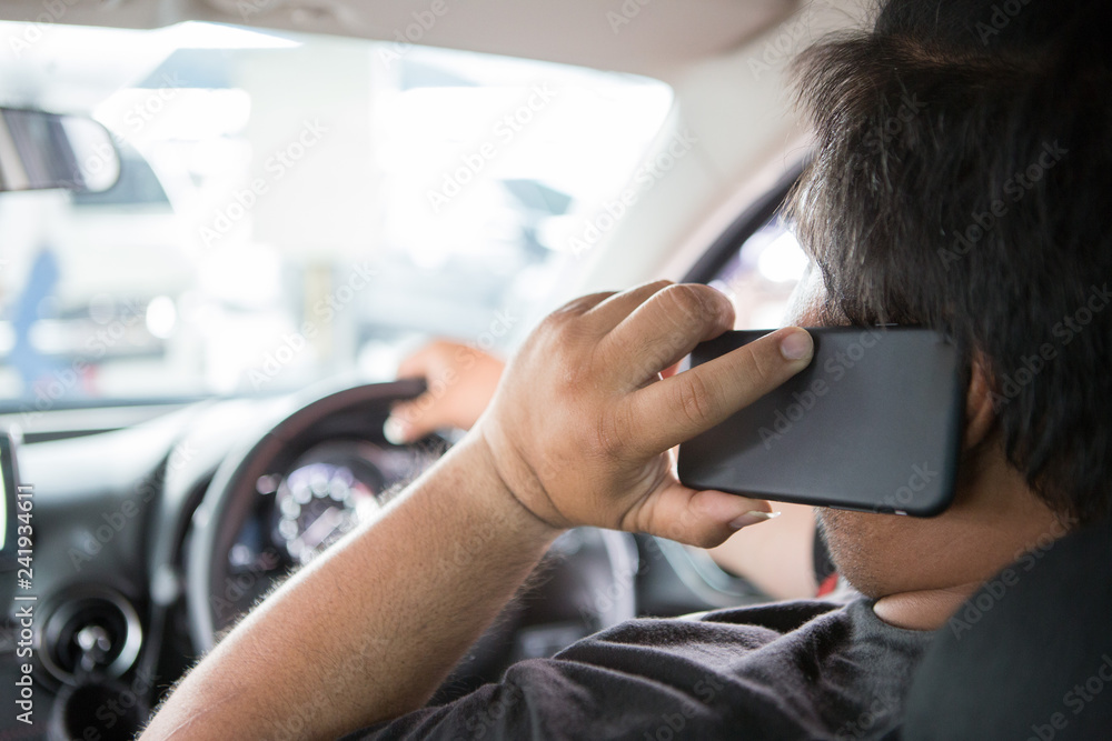 Man talk mobile phone while driving Man talk mobile phone while driving