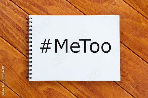 Top view of notebook written with hashtag MeToo.