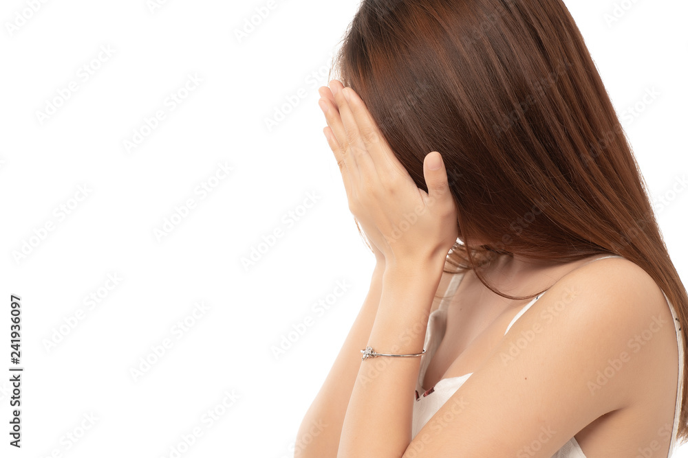 Young asian woman hides her face; failed girl doing facepalm; asian adult business woman. Young asian woman hides her face; failed girl doing facepalm; asian adult business woman.