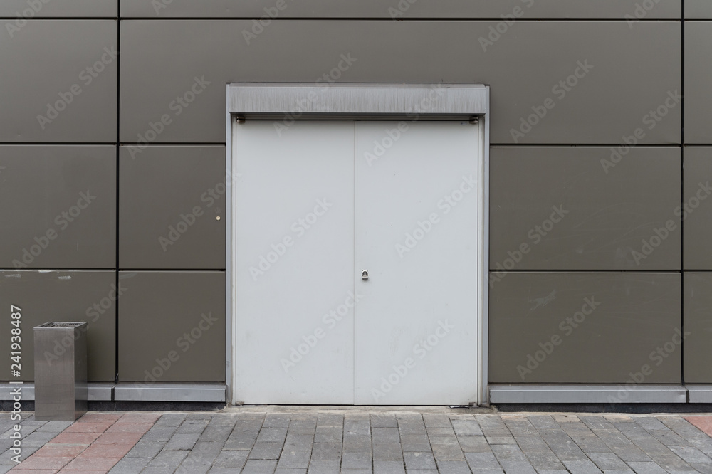 sidewalk by street wall & door sidewalk by street wall & door