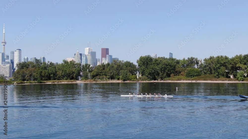 Aerial View of Lake Ontario, Toronto Skyscrapers with Rowers in Lake Ontario Aerial View of Lake Ontario, Toronto Skyscrapers with Rowers in Lake Ontario
