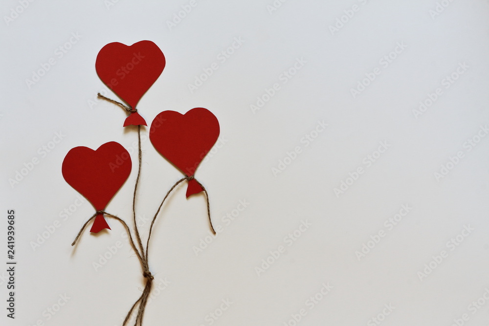 Homemade background to day of lovers and mother's day. Stylized balloons on a white background. Minimalism style.