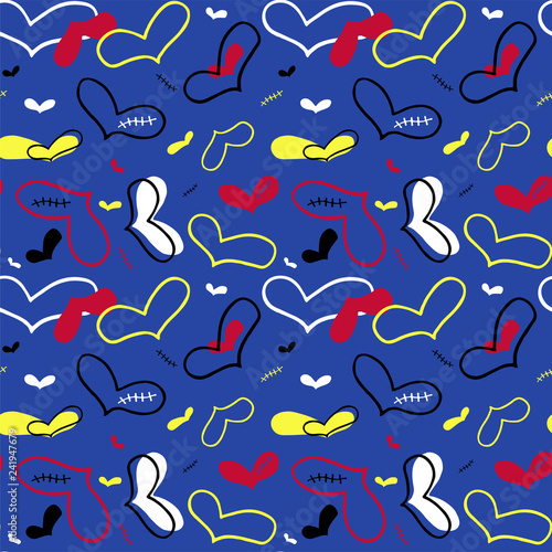 Vector seamless pattern of hand drawn red, yellow, white hearts