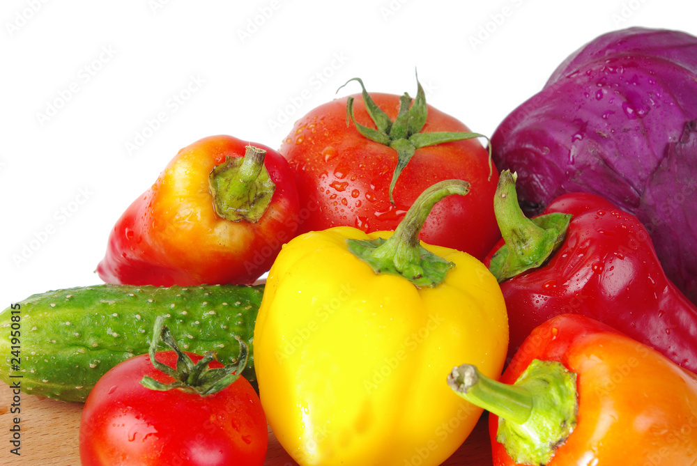 A variety of delicious vegetables. Copy space. Isolated on white A variety of delicious vegetables. Copy space. Isolated on white