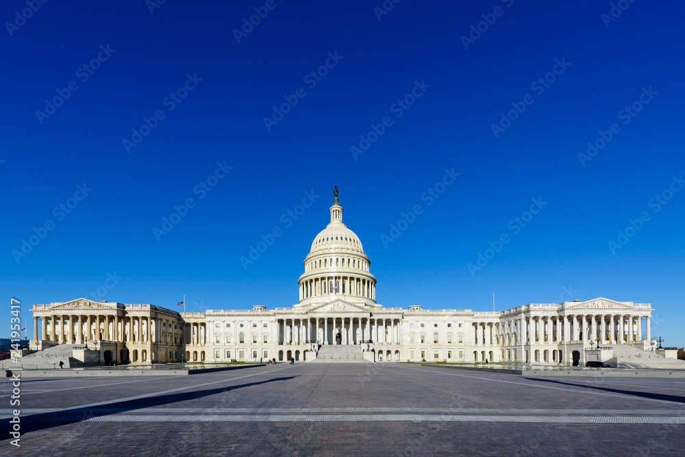 Fototapeta premium Panoramic view of The United States Capitol building in the morning with blue sky, Washington DC