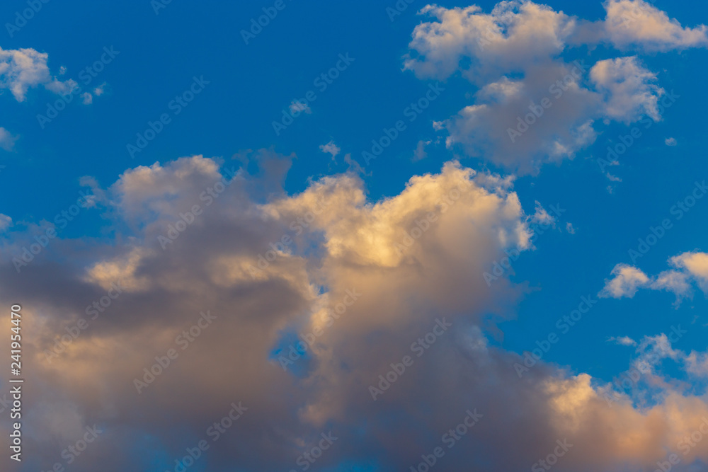Clouds in the sky at sunset as a background