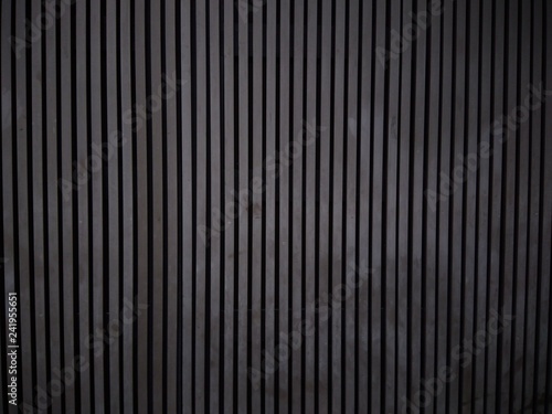 Black wood plank wall texture background. Vertical wooden. Loft style 