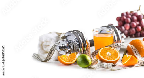 Fototapeta Naklejka Na Ścianę i Meble -  Sport dumbbells fresh fruit measure tape and multivitamin juice isolated on white background. Healthy sport and diet concept.