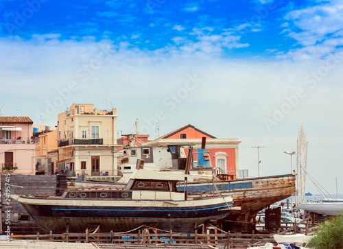 Acitrezza harbor with fisher boats next to Cyclops islands  Catania  Sicily  Italy.
