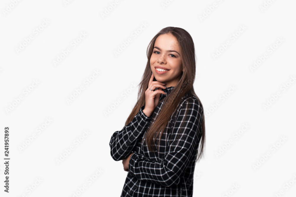 Photo of pretty woman, in tshirty standing over white background Photo of pretty woman, in tshirty standing over white background