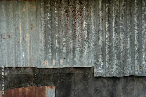 Old walls made of zinc and rubber sheets for background of vintage house. photo