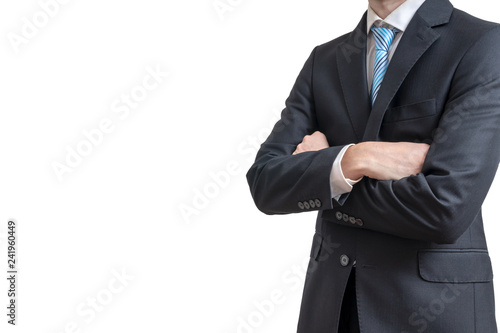 Businessman has crossed arms. Isolated on white background.