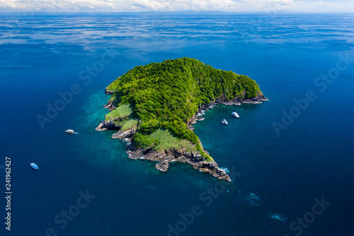 Aerial drone view of a remote, beautiful tropical island surrounded by coral reef (Ko Bon, Thailand) © whitcomberd