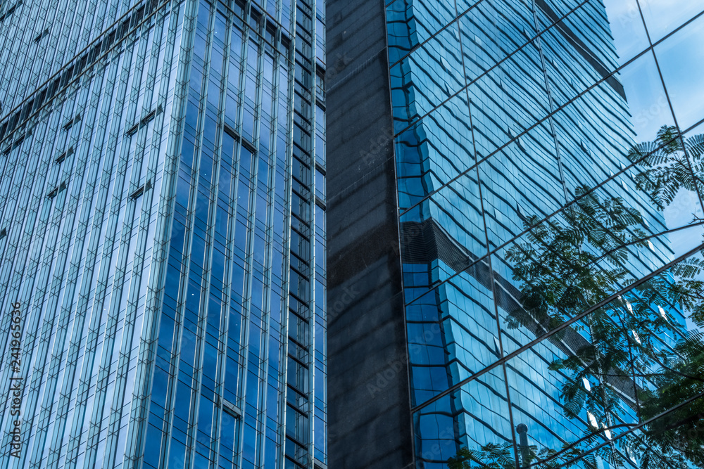 Urban abstract - windowed corner of office building.