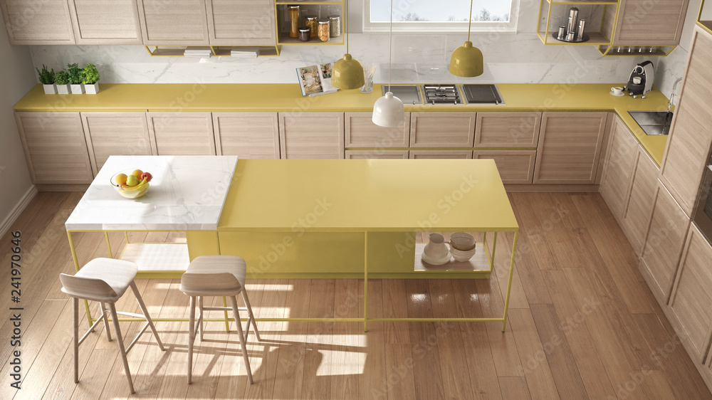 Modern white and yellow kitchen with wooden details and parquet floor ...