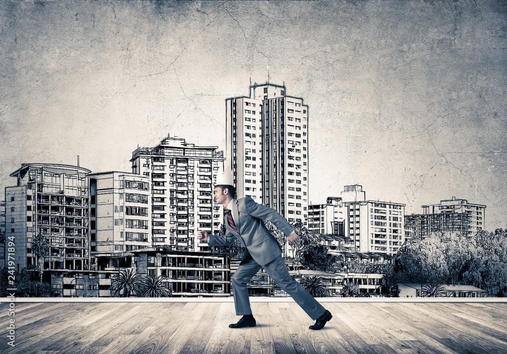 King businessman in elegant suit running and drawn cityscape sil