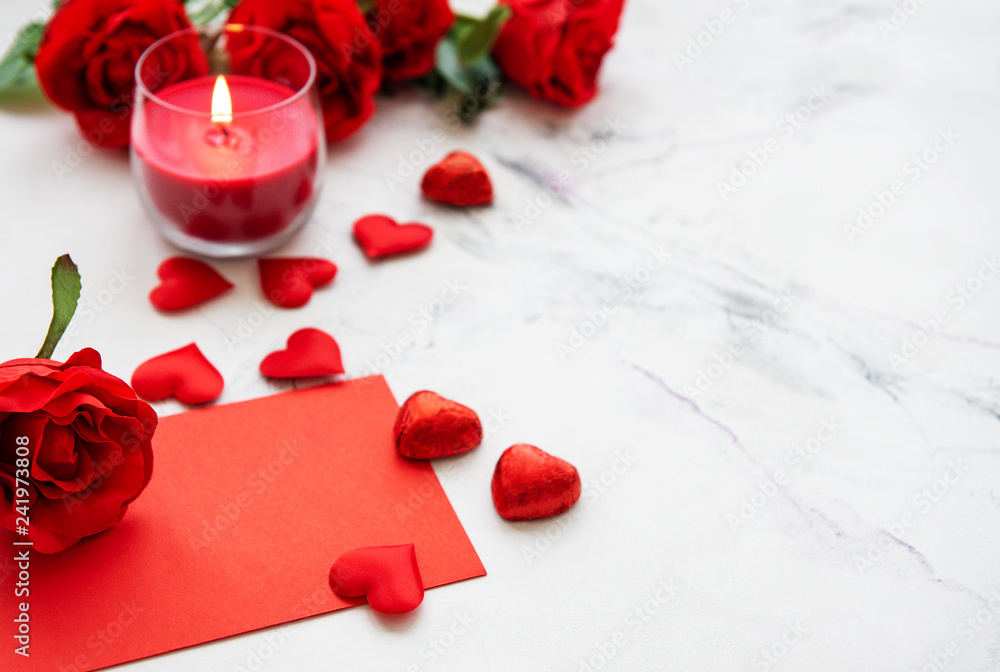 Valentines day romantic background - red roses, candle and hearts
