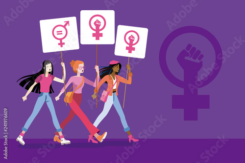 Women with placards with the symbol of feminist fight