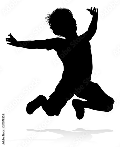 A high quality detailed kid or child in silhouette playing and having fun