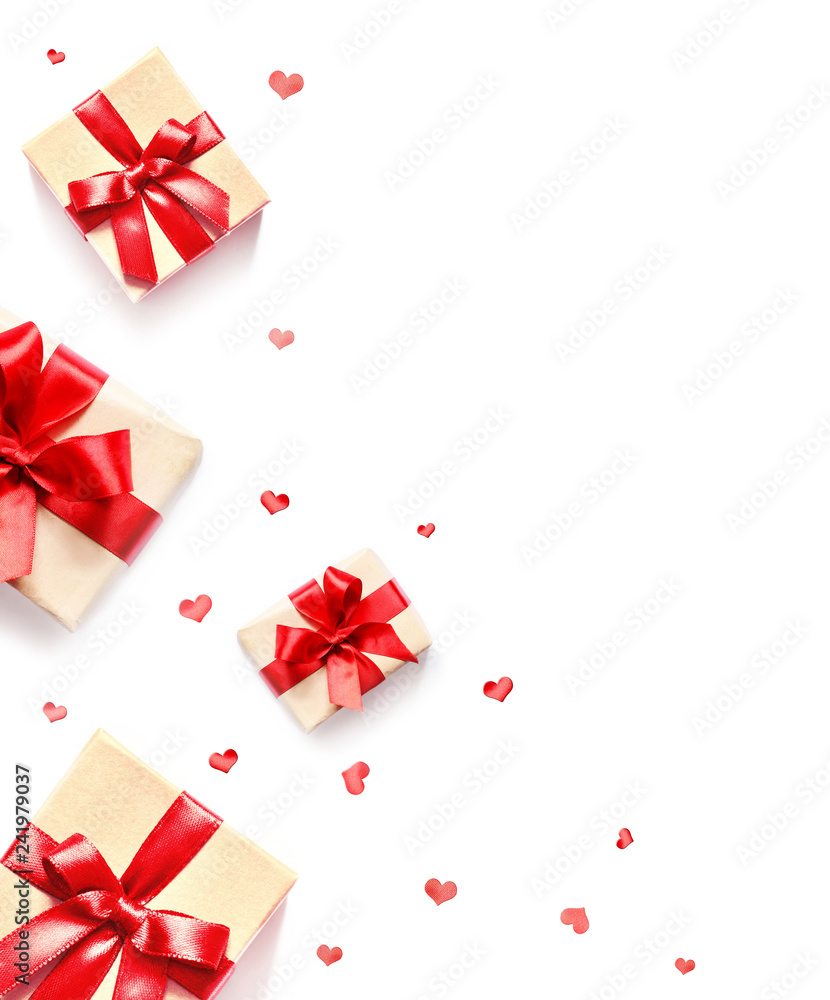 Gift box with red ribbon and heart on white background.