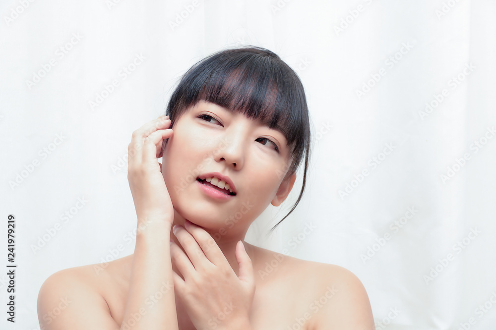 Beautiful Young Woman with Clean Fresh Skin touch own face . Facial treatment . Cosmetology , beauty and spa. Beautiful Young Woman with Clean Fresh Skin touch own face . Facial treatment . Cosmetology , beauty and spa.