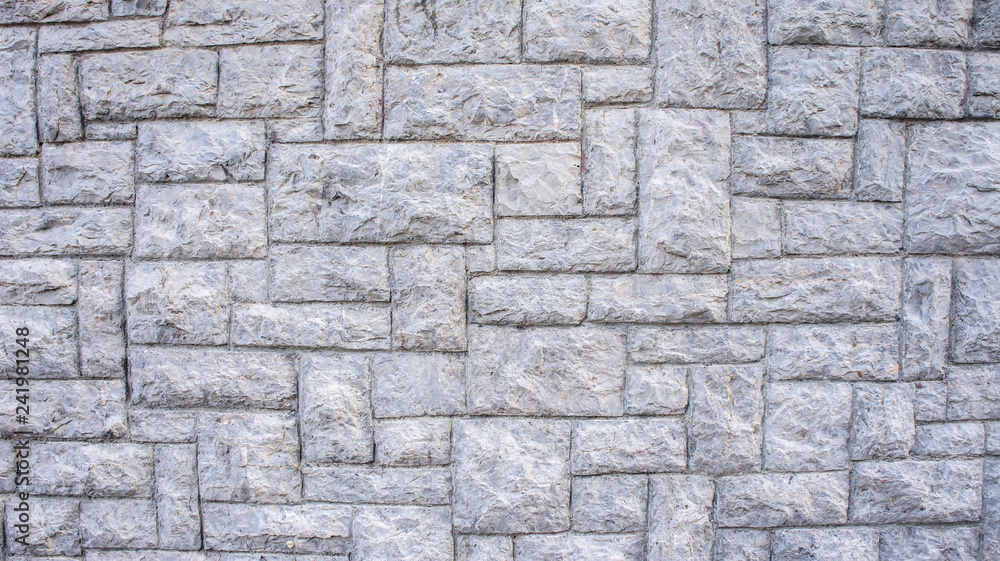Fototapeta premium Gray stone wall background texture
