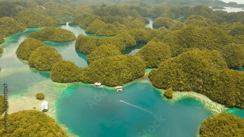 aerial seascape islands in bays and lagoons with turquoise water bucas grande, sohoton cove. islands covered with green tropical forest surrounded by beautiful bays and lagoons tropical seascape blue photo