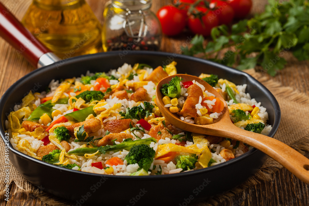 Nasi goreng. Fried rice with egg and vegetables. Nasi goreng. Fried rice with egg and vegetables.