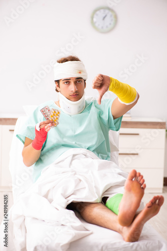 Young injured man staying in the hospital 