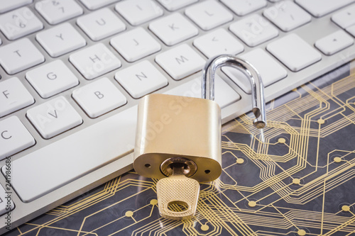 Cyber security with key lock, keyboard, circuit board.
