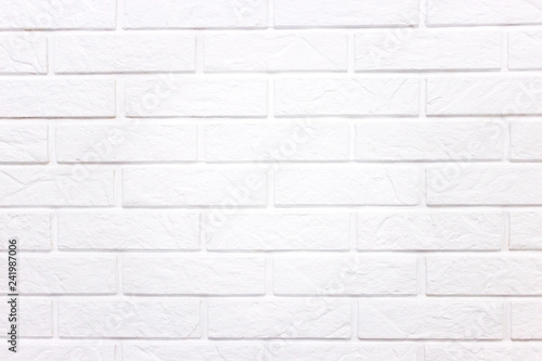 White wall of light brick, background with white brick.