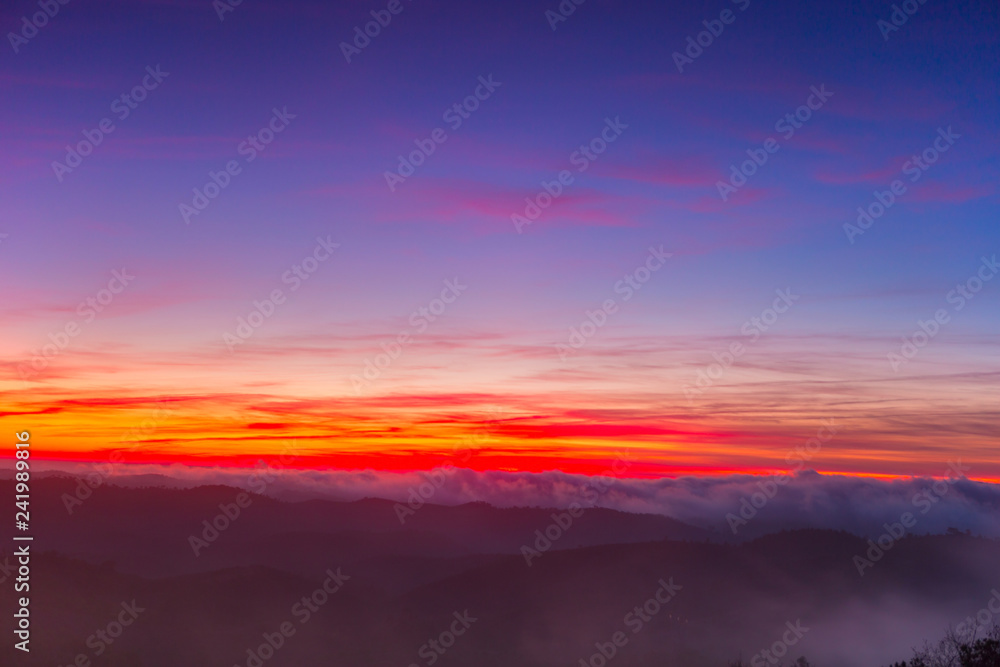 Picturesque Sunset Over Misty Landscape