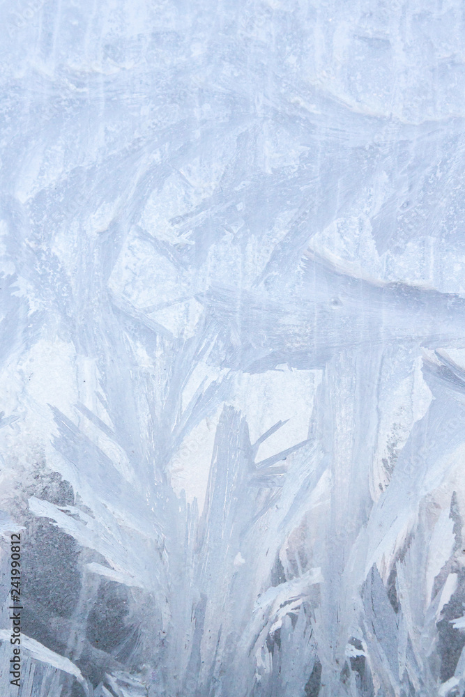 Frosty patterns on a frozen ice box in the early morning Frosty patterns on a frozen ice box in the early morning
