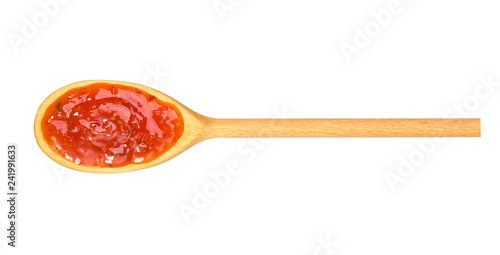 Sweet chili sauce in  wooden spoon isolated on white background,top view